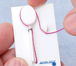 Wire being wrapped around jig